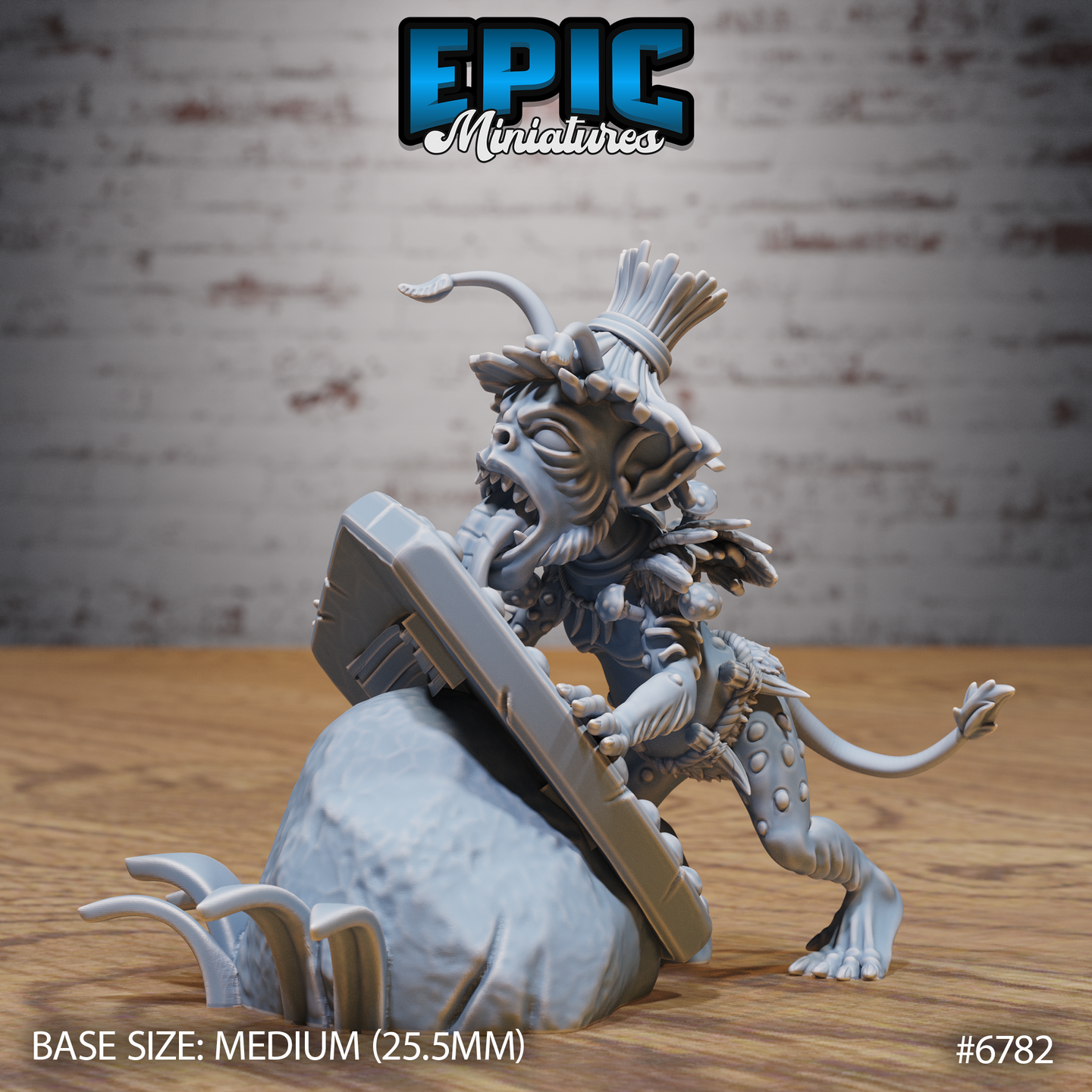 Unpainted grey resin miniature of a feral jungle goblin crouching behind a large studded shield, tongue lolling, wearing a tall reed feather headdress and tribal bone adornments, mounted on a scenic rock base with clawed roots — front three-quarter view, 25.5mm base, Epic Miniatures sculpt #6782