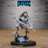 Front three-quarter view of an alternate head variant of the Frog Folk Hunter miniature — same crossbow-wielding pose and rocky base, but featuring a spiny crested head with angular fins, giving a shaman-elder quality to the frog-kin warrior
