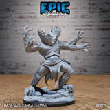 Gug Abomination miniature by Epic Miniatures — large fanged creature with four clawed arms spread wide, chest-mounted maw ringed with teeth, torso wrapped in bandages, crouching over a rocky rubble base.
