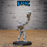 Long-haired brawler seen from behind, mechanical crusher arm thrust upward, spiked shoulder collar and reinforced jacket visible, standing on a round base. Sculpt by Epic Miniatures.