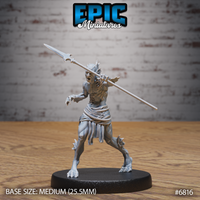 Ferocious fish-folk creature lunging forward with a long barbed spear levelled in both hands, mouth open in a battle cry, rope loincloth, taloned feet braced wide. Sculpt by Epic Miniatures.