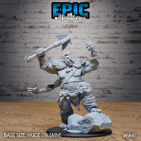 Massive broad-featured giant roaring with mouth open, raising a large battle axe overhead in one hand and clawing outward with the other, wearing a fur mantle, studded belt, and rope bindings on forearms and ankles, standing on a rocky scenic base. Sculpt by Epic Miniatures.
