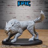 Ferocious dire wolf miniature in a low stalking crouch, head lowered with jaws wide open in a snarl, hackles raised across the shoulders in sharp layered tufts. Epic Miniatures sculpt on a large oval base.