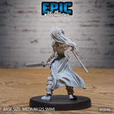 Female elf barbarian seen from behind, long hair flowing freely down her back, cloak billowing to one side, longsword raised in her right hand and staff trailing in her left. Sculpt by Epic Miniatures.