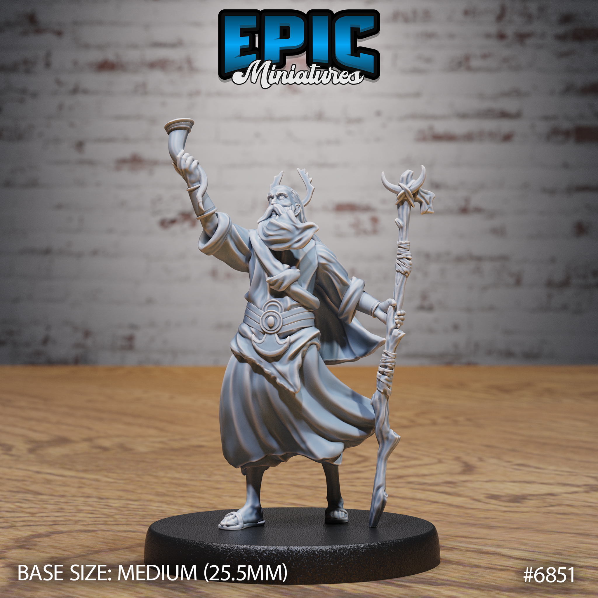 Bearded druid in horned helm striding forward, raising a drinking horn aloft with one hand and gripping a forked gnarled staff with the other, robes billowing. Sculpt by Epic Miniatures.