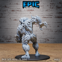 Yeti sculpt viewed from behind showing dense layered fur tufting across the back, broad muscular shoulders, and a raised clawed hand curling outward. Thick legs end in wide splayed feet. Epic Miniatures.