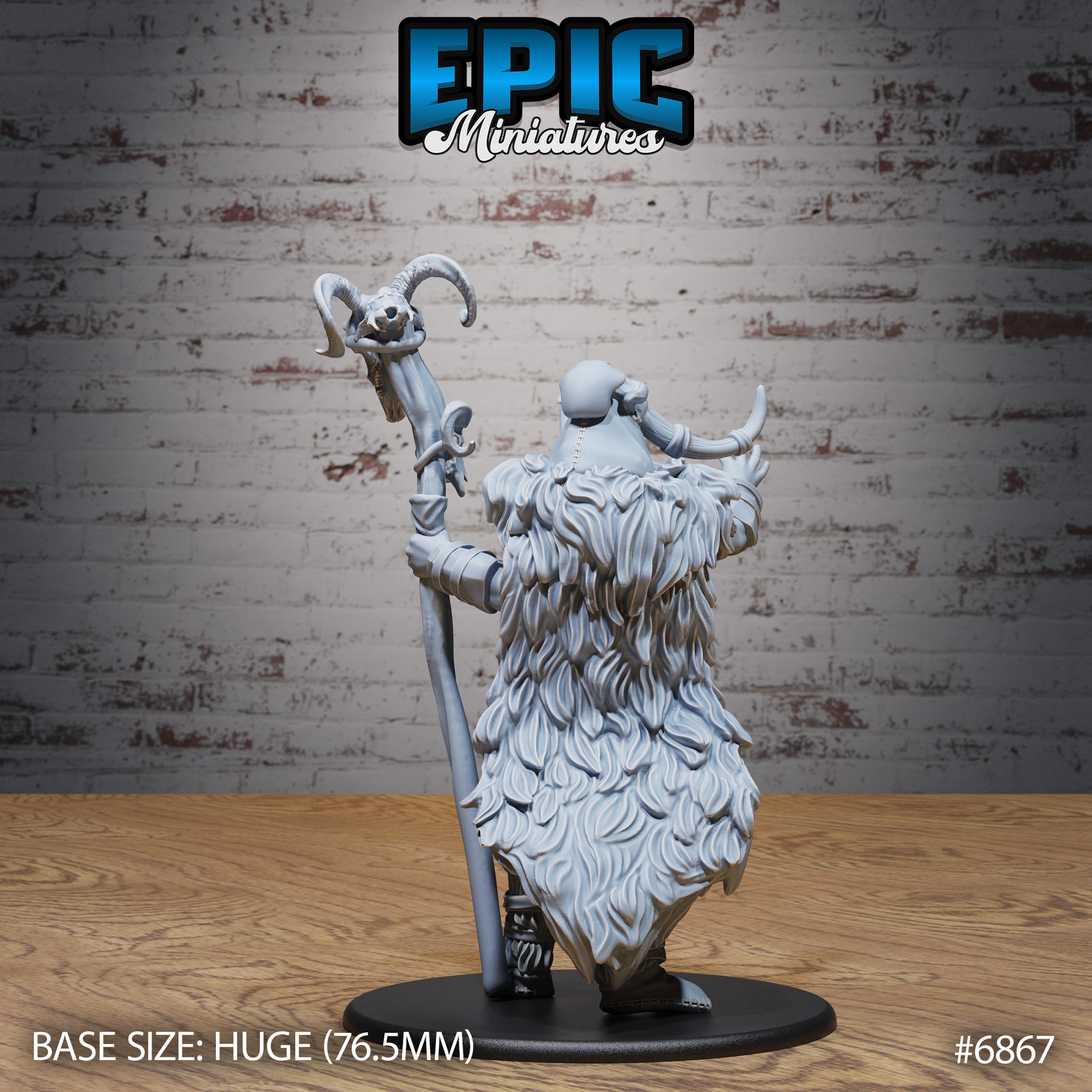 Frost Giantess miniature by Epic Miniatures — showing the rear of the sculpt. The thick fur cloak dominates, rendered in dense claw-like tufts from shoulders to hem. The tall bone staff extends high overhead, topped with a curling ram skull. Bald scalp and horn tips visible above the collar of the pelt.