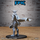 Broad-shouldered male warrior in horned helm seen from behind, long hair flowing beneath the helmet, full-length cape swept dramatically to one side, warhammer visible at hip. Sculpt by Epic Miniatures.
