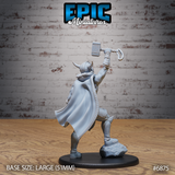 Rear view of a horned-helmed warrior with a large flowing cape with stitched border, hammer raised in one outstretched hand and axe held low, standing on a rocky sculpted crag base. Sculpt by Epic Miniatures.