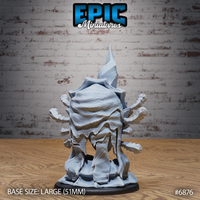 Rune Warped Eye Tyrant by Epic Miniatures — rear view of the unpainted grey resin model revealing a mass of fleshy tentacle-like appendages beneath the armoured body, with eyestalks visible at the sides and the jagged dorsal spine rising above the creature.