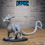 Crystal Guard Drake by Epic Miniatures — rear view showing the long whip-like barbed tail sweeping outward, with the raised crown of asymmetrical horns and heavy spinal ridges clearly visible across the back.