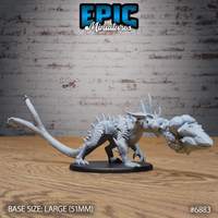 Crystal Guard Drake Firebreath by Epic Miniatures — low-slung armoured drake in a prowling stance, crystal-shard dorsal spines, broad crushing head, thick taloned forelegs, long whip-thin tail extended behind.