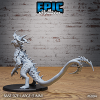 Crystal Guard Drake Roar by Epic Miniatures — rear-facing pose showing full spine ridge fins, nodule clusters along neck and shoulders, whip-like tail curving outward with hooked spines at the tip. Large 51mm base.