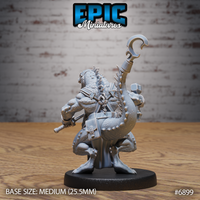 Kobold blacksmith seen from behind, revealing a heavily textured scale-covered back, dorsal spines, thick curved tail, slung hooked staff, and a small satchel at the hip, clawed feet gripping the base. Sculpt by Epic Miniatures.