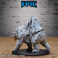 Armoured bear rider seen from behind, cloak billowing outward, studded armour plates covering the bear's back and haunches, detailed fur texture visible across the bear's legs and shoulders. Sculpt by Epic Miniatures.