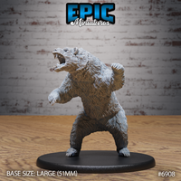 Ferocious bear rearing upright on hind legs, jaws wide open in a roar, one forepaw raised with claws splayed, thick shaggy fur texture across the whole body. Sculpt by Epic Miniatures.