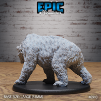 Large bear sculpt viewed from behind and to the side, showing the deep shaggy fur texture across the haunches and back, heavy muscular build, and thick clawed feet. By Epic Miniatures.