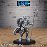Armoured knight in full gothic plate standing upright, holding a long halberd planted to the right, wearing a horned great helm and a sweeping cape. Sculpt by Epic Miniatures.