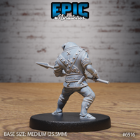 Dog-folk noble miniature with a snarling jowled face, broad-stance posture, levelling a long spear forward in a guard position, dressed in a close-cut buttoned doublet and buckled boots. Sculpt by Epic Miniatures.
