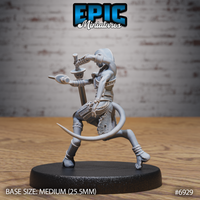 Reptilian female warrior crouched low with sword raised overhead in a striking grip, tail curled behind, wearing shin guards and fabric leg wrappings. Sculpt by Epic Miniatures.