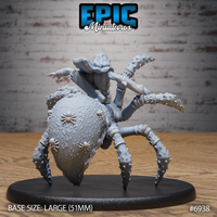 Rear view of a dwarf drider showing a bulbous textured spider abdomen covered in raised spider motifs, hooded cloak draped over the upper body, eight spiked chitinous legs splayed wide. Sculpt by Epic Miniatures.