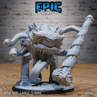 Spectator Tyrant Ray by Epic Miniatures — massive scaled sphere-bodied creature with wide open jaws, elongated lolling tongue, dorsal spines, and writhing tentacle eyestalks, bursting between two dungeon columns on a cracked flagstone base.