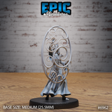 Gith Queen Spellshield miniature by Epic Miniatures — masked robed queen standing within a tall oval frame of swirling arcane spiral loops, one hand raised, flowing robes, on a round base.