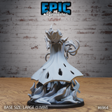 Rear of the Mind Overlord miniature showing ragged void-like holes in the flowing robe, a bladed crown, and sinuous tentacles curling from the sides over a swirling base. Sculpt by Epic Miniatures.