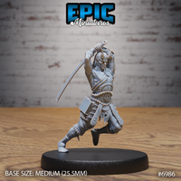 Tiefling barbarian lunging forward with a curved blade raised overhead in both hands, horns curving back, chains wound around forearms, wearing a chest wrap and studded waist plate. Sculpt by Epic Miniatures.