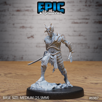 Horned tiefling barbarian advancing with a hand axe raised in his right hand and a short blade lowered in his left, wearing spiked chain-wrapped pauldrons, a scale-plated kilt, and studded leg armour. Rocky scenic base. Sculpt by Epic Miniatures.