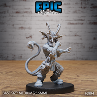 Snarling tiefling goblin miniature with spiralling ringed horns, bat ears, clawed hands raised mid-gesture, shaggy fur legs and a long lion tail with tufted tip. Sculpt by Epic Miniatures.