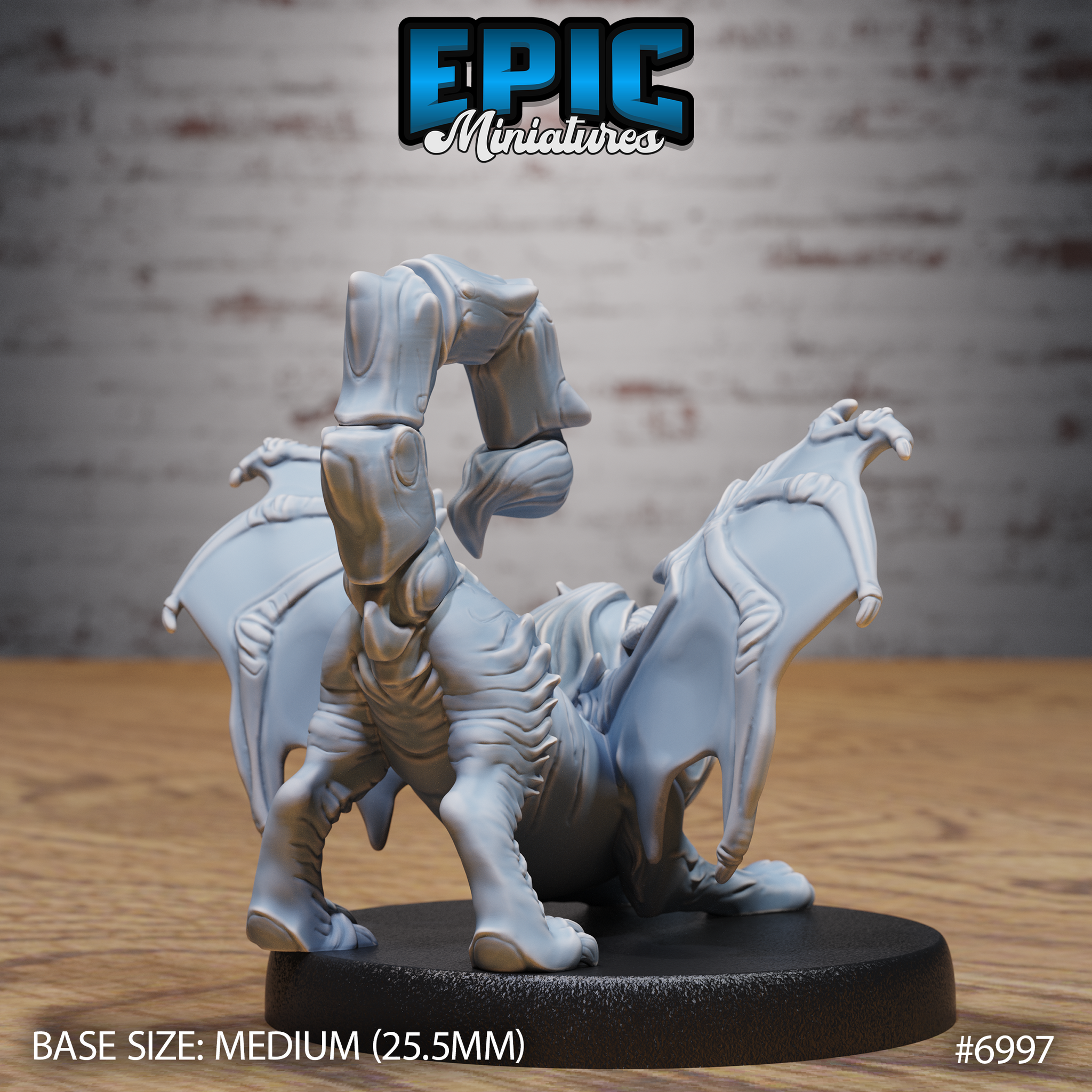 Manticore cub seen from behind, showing the full spread of leathery bat wings, muscular haunches, thick clawed feet, and arching barbed tail curling forward over the body. Sculpt by Epic Miniatures.