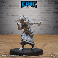 Tiefling female researcher mid-stride, wild curly hair with small horns, holding a round object in one hand and thrusting a cylindrical implement forward in the other, layered robes with pouches and a braided belt. Sculpt by Epic Miniatures.