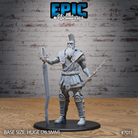 Bearded Storm Giant warrior standing upright, holding a curved greatsword at his side and a jagged lightning bolt in his raised right hand, wearing a plumed crested helmet, scaled chest armour, pteruges skirt, and studded greaves. Sculpt by Epic Miniatures.