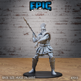 Massively built bearded giant lord in a wide combat stance, arm raised overhead gripping a jagged lightning bolt, wearing a crested helm, scaled armour, and layered pteruges skirt. Sculpt by Epic Miniatures.