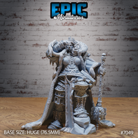 Armoured giantess queen gripping an ornate rune-carved staff, wearing engraved plate armour and a thick fur-trimmed ceremonial cloak, hair flowing freely, mounted on a huge rocky base. Sculpt by Epic Miniatures.