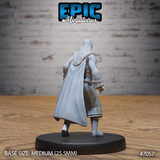 Long-haired male vampire viewed from behind, cape billowing as he strides forward, detailed embroidered hem and sash visible on his long coat, one leg raised mid-step. Sculpt by Epic Miniatures.