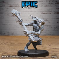 Snarling ghoul-like creature crouched in mid-lunge, gripping a large stone-headed club with both clawed hands raised to strike, wearing a ragged hide skirt. Sculpt by Epic Miniatures.