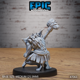 Rear view of a crouching ghoul miniature showing a ridged spine, crude layered hide garment cinched at the waist, and a raised stone club wrapped in sinew cord. Sculpt by Epic Miniatures.