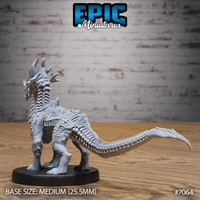 Obsidian Guard Drake by Epic Miniatures — rear three-quarter view showing full length of the heavily scaled spine and segmented tail sweeping out to a curved blade tip, dorsal ridges running from horned crest to tail base.