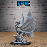 Fairy dragon miniature perched on a rocky crag, wings spread wide, slender neck raised, scaled body coiled with tail curling around the base. Sculpt by Epic Miniatures.
