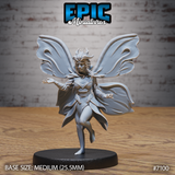 Fey Folk Queen by Epic Miniatures — winged fey figure mid-step, one leg raised, arms outstretched with spread fingers, wearing fitted armour and an organic crown of sharp upswept spires, four layered butterfly wings spread wide behind her.