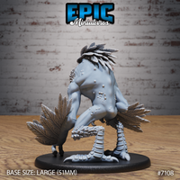 Owl Beast sculpt seen from behind, muscular humanoid back covered in warty texture and scattered nodules, feathered arms flanking, scaled legs and large taloned feet. Sculpt by Epic Miniatures.