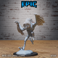 Owl Beast Attack by Epic Miniatures — humanoid creature with an owl-disc face, wide eyes and open beak, arms thrown wide with splayed talons, large feathered wings fanned out, scaled raptor legs, one foot raised mid-lunge above a sculpted mist base.