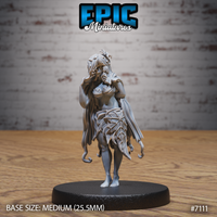 Dryad miniature by Epic Miniatures — a barefoot female figure standing upright, wearing a skirt of large veined leaves and a leaf bodice, with long flowing hair threaded through with foliage and curling tendrils at her hem.