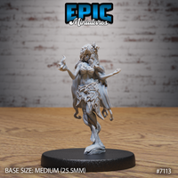 Dryad spirit miniature by Epic Miniatures, one heel raised in a dancer's pose, left hand cupping a small flame, right arm extended open, body transitioning into bark-like growth with leaf wrapping at the waist and root tendrils at the feet.