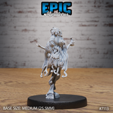 Rear view of the Dryad Magic miniature by Epic Miniatures, showing cascading hair with wood-grain texture flowing down the back, leaf and flower details at the waist, and gnarled root-like lower limbs ending in spiral formations at the base.