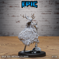Rear view of an antlered fey knight showing an intricately layered feathered cloak covering the full back, with elongated legs and a longsword held at the side, on a rocky scenic base. Sculpt by Epic Miniatures.