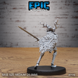 Rear view of an antlered knight miniature showing an elaborate layered cloak of dense feathered scales sweeping across the back, with stag antlers rising from a wooden mask. Sculpt by Epic Miniatures.