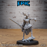 Antlered fey guardian miniature holding a longsword at her side and a severed human head aloft, wearing layered feather-plate armour, standing on a rocky sculpted base. Sculpt by Epic Miniatures.